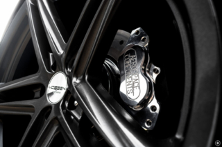 Bagged and Boosted S197 Mustang Showcasing Aerospace Components Brakes